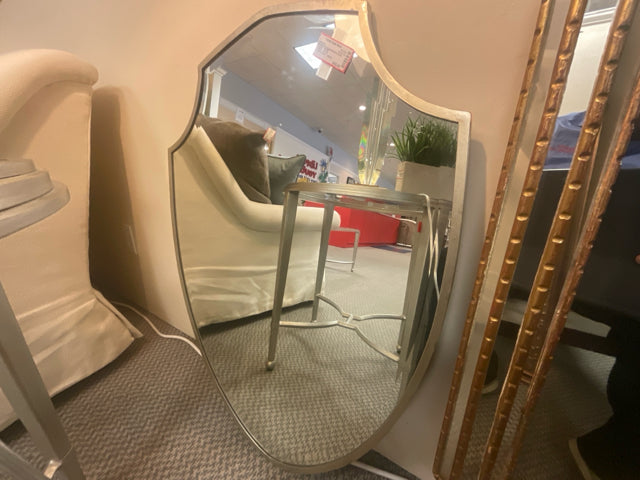MIRROR IN THE SHAPE OF A SHEILD